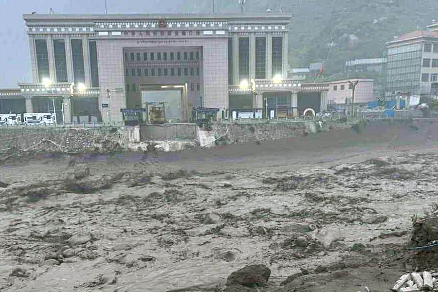 Severe floods at Rasuwagadhi sweep away Miteri Bridge and vehicles, leaving 15 missing and sparking urgent rescue efforts near Nepal-China border.