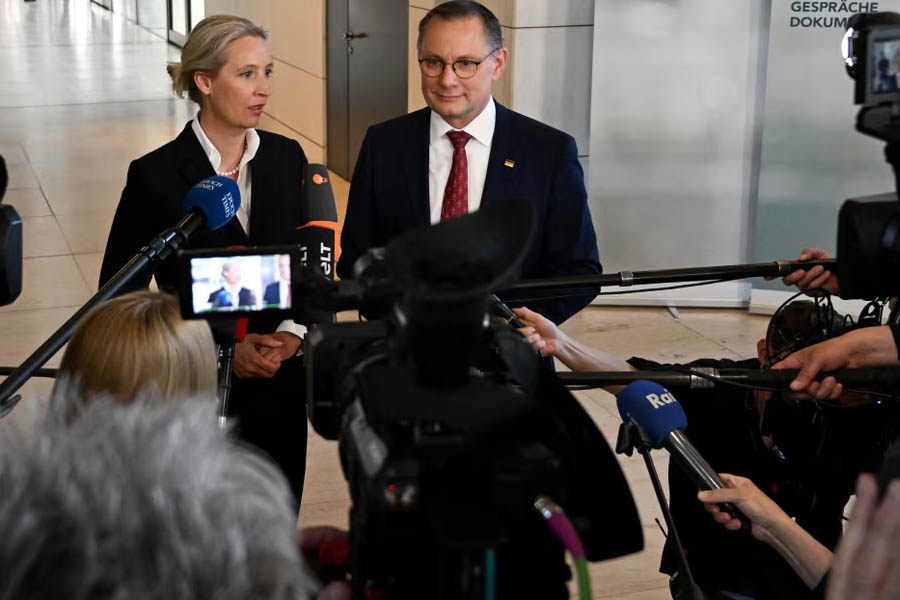 The co-leaders of the far-right Alternative for Germany (AfD) party Alice Weidel and Tino Chrupalla address journalists.