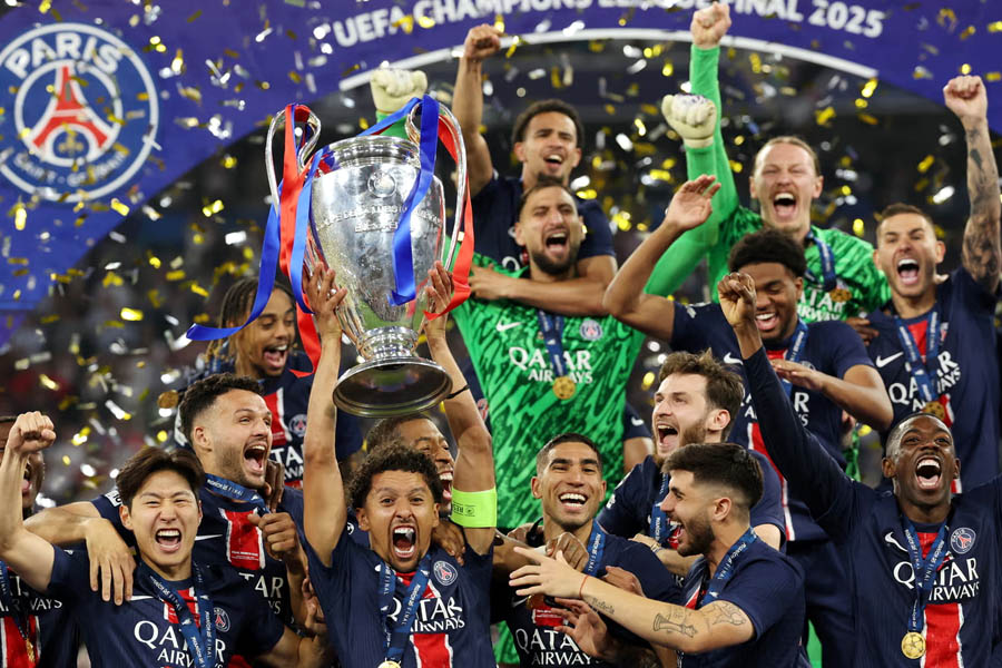 PSG captain Marquinhos lifts the Champions League trophy after his team’s sensational 5-0 victory over Inter in the final