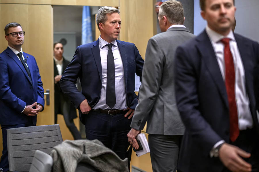 Daniel Driscoll talking with US staff following closed-door discussions with the Ukrainian delegation at the US Mission in Geneva.