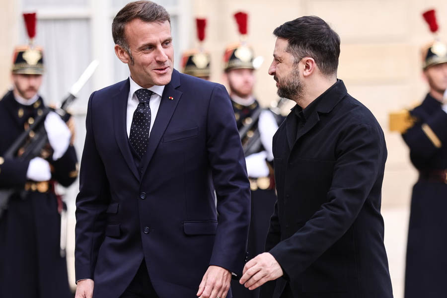 Emmanuel Macron greeting Volodymyr Zelenskyy at the Élysée Palace in Paris on Monday.