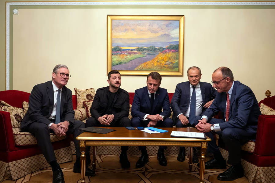Keir Starmer, Volodymyr Zelenskyy, Emmanuel Macron, Donald Tusk and Friedrich Merz make a call to Donald Trump from Kyiv on 10 May 2025.