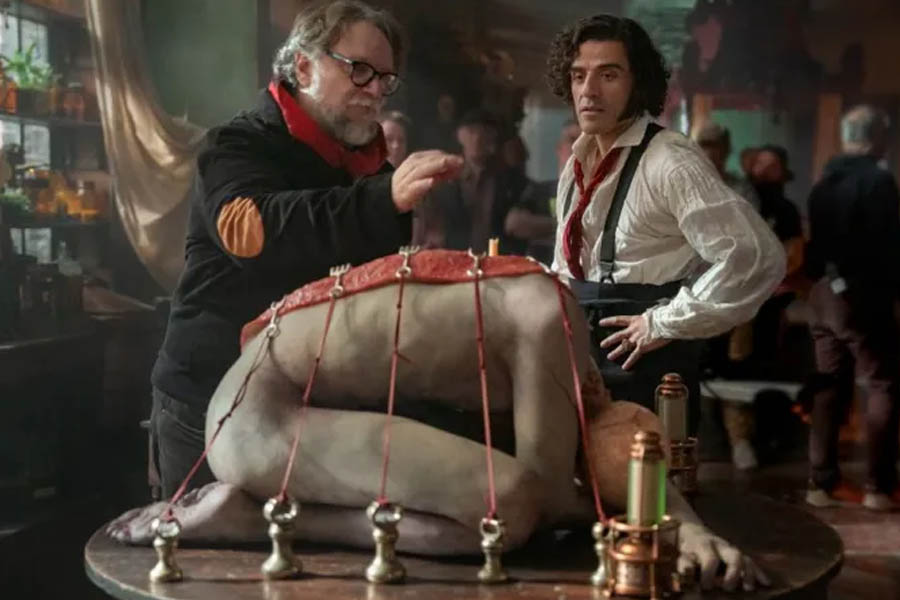 Director Guillermo del Toro on the set of Frankenstein, highlighting his use of real sets with minimal CGI.