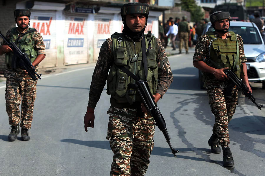 Indian security forces patrol in Kashmir. India and Pakistan are on high alert a day after Delhi launched a deadly missile attack on its neighbour.