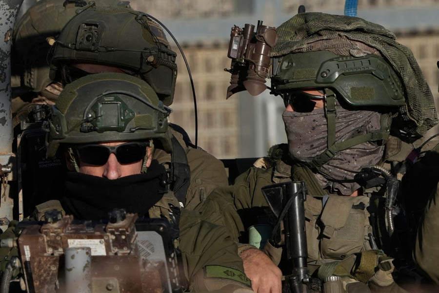 Israeli soldiers crossing into the UN buffer zone between Israel and Syria after Assad’s fall in December 2024.