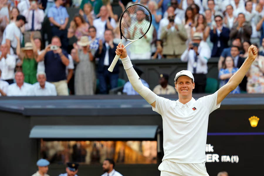 Jannik Sinner celebrates his first Wimbledon title after defeating Carlos Alcaraz in four sets to claim his fourth Grand Slam crown.