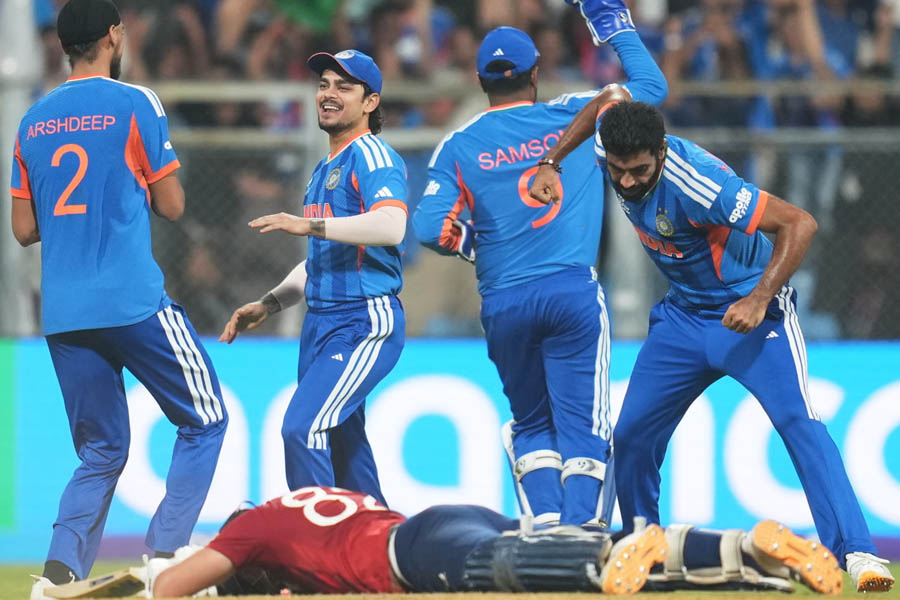 Jasprit Bumrah of India celebrates with teammates after England’s Jacob Bethell is run out in the last over of the T20 World Cup 2026 semi-final.
