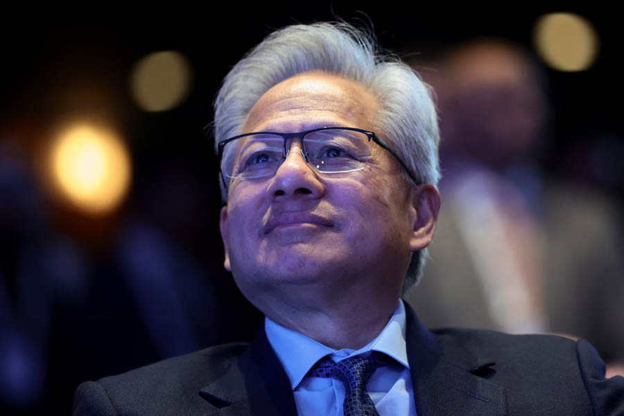 Nvidia CEO Jensen Huang speaking at the US-Saudi Investment Forum in Washington, highlighting developments in AI and industry investment trends.