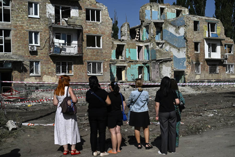 Residential building destroyed in Kyiv by Russian drone and missile attack; President Zelenskyy pledges retaliatory strikes on Russia.