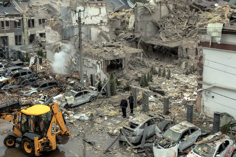 Damaged residential buildings on the outskirts of Kyiv following a 12-hour Russian bombardment that left four people dead and dozens injured.