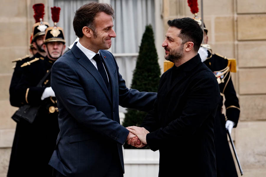 Emmanuel Macron greeting Volodymyr Zelenskyy at the Élysée Palace during their ninth meeting since Russia’s invasion of Ukraine.
