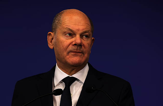 German Chancellor Olaf Scholz loses a historic vote of confidence in the Bundestag, triggering early elections on February 23