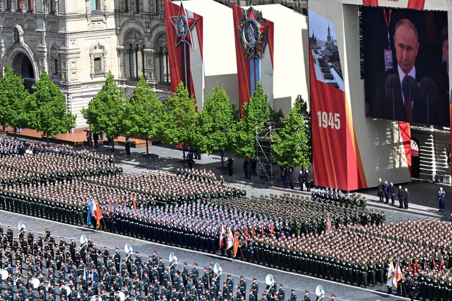 Military troops stand in formation in Red Square before the Victory Day military parade in Moscow, Russia.