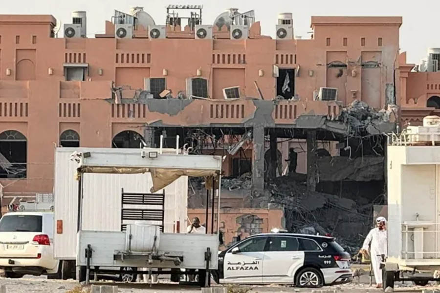 Israeli airstrike aftermath in Doha, Qatar — residential buildings reportedly housing Hamas political bureau members damaged, smoke rising above city.