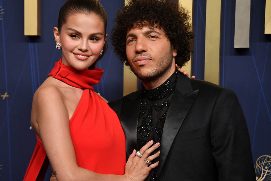 Selena Gomez and Benny Blanco posing together on the red carpet at the Emmy Awards in Los Angeles, September 14, 2025.