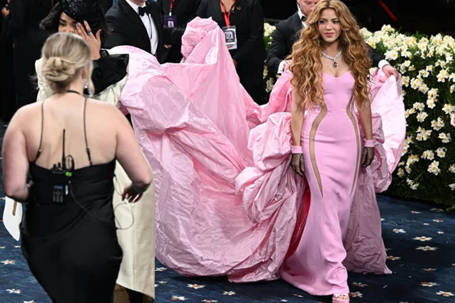 Shakira goes full princess in custom Prabal Gurung, with a crushed satin cloak that’s heavily reminiscent of André Leon Talley.