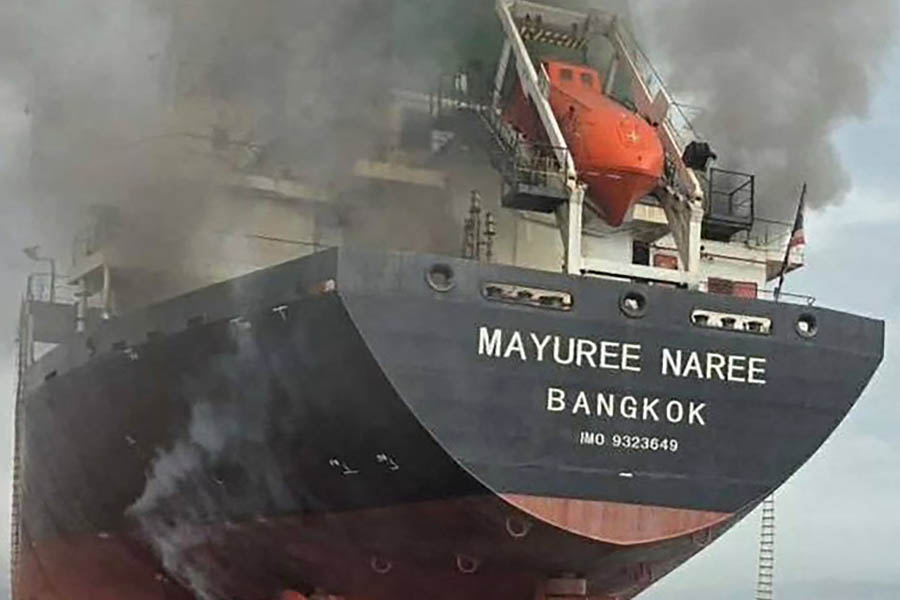 Thai bulk carrier ship on fire after being hit near the Strait of Hormuz during rising Middle East maritime attacks.