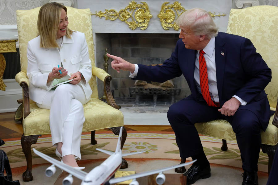 Donald Trump shares a light-hearted moment with Italian Prime Minister Giorgia Meloni in the Oval Office on 17 April 2025.