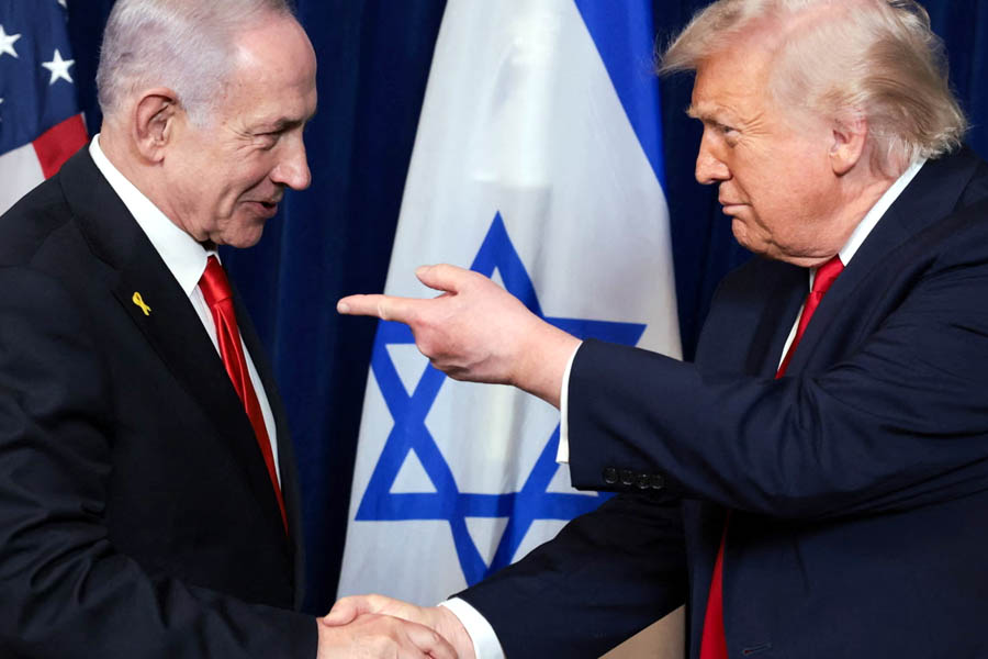 Donald Trump shaking hands with Benjamin Netanyahu at the Mar-a-Lago resort in Florida