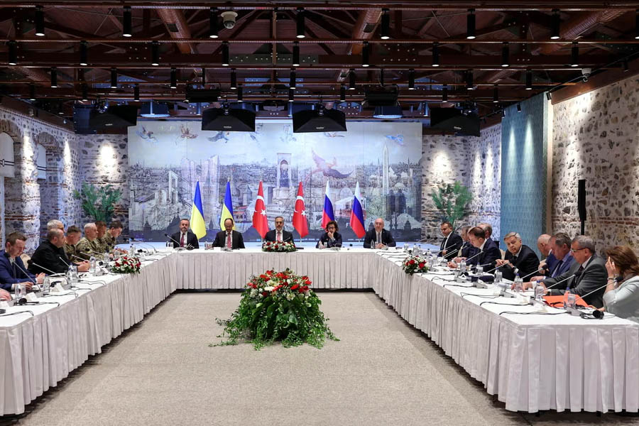 The Turkish foreign minister, Hakan Fidan, chairs a meeting between delegations from Russia and Ukraine at Dolmabahce palace in Istanbul.