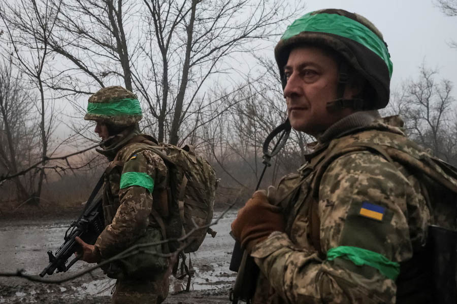 Ukrainian soldiers heading toward a combat mission near Pokrovsk in the Donetsk region during ongoing fighting with Russian forces.