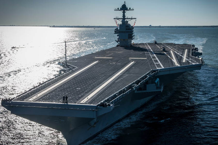 The USS Gerald R. Ford aircraft carrier at sea as it deploys to the Middle East to join the USS Abraham Lincoln, strengthening US military presence and naval capabilities in the region.