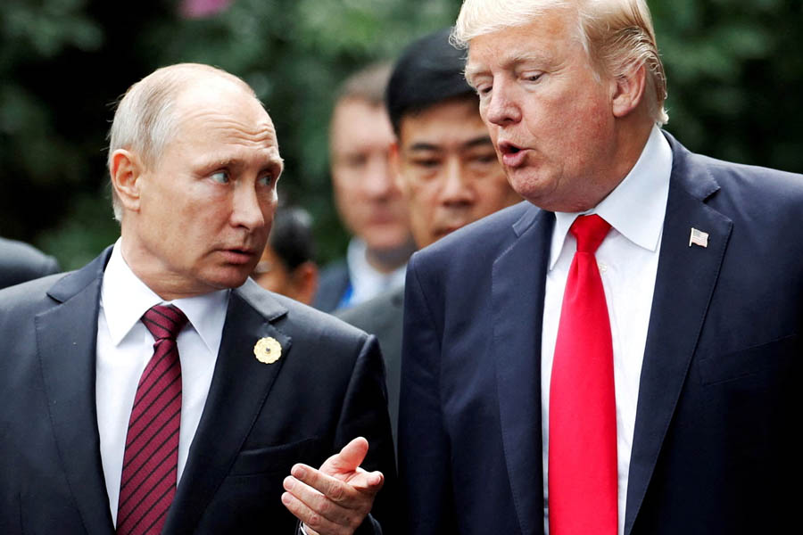 Vladimir Putin and Donald Trump in 2017 — reports suggest a potential US-Russia deal could let Putin retain parts of Ukrainian territory captured by Russian forces.