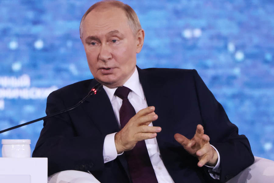 Vladimir Putin addressing an economic forum in Vladivostok, warning that Western forces in Ukraine would face destruction.