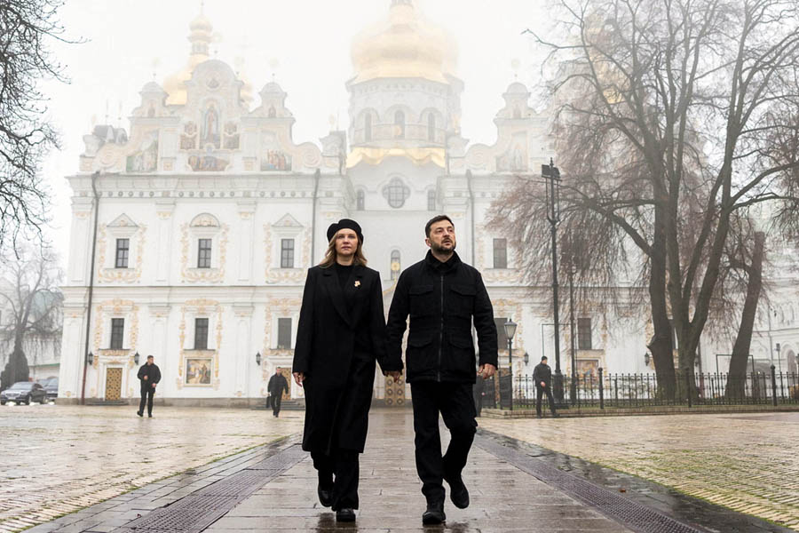 Volodymyr Zelenskyy and his wife Olena standing together after the Holodomor remembrance ceremony in Kyiv.