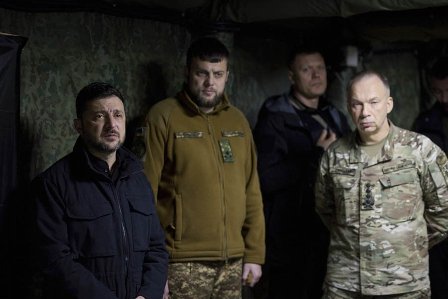 Volodymyr Zelenskyy and General Oleksandr Syrskyi listening to a military briefing on Ukraine’s defensive operations near Pokrovsk in Donetsk region.